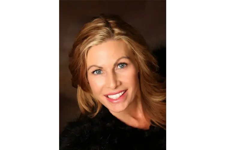 Patient smiling in a portrait after dental treatment
